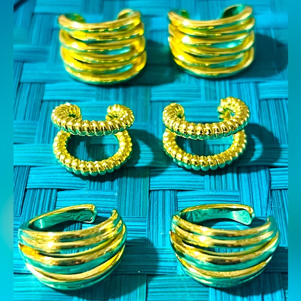 New! Gold ear cuffs. 3 different sets. Sold by set at $20 each.Stainless steel.